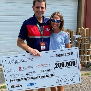 Ledgestone Insurance Open donation check Donation Check for charity for $200,000